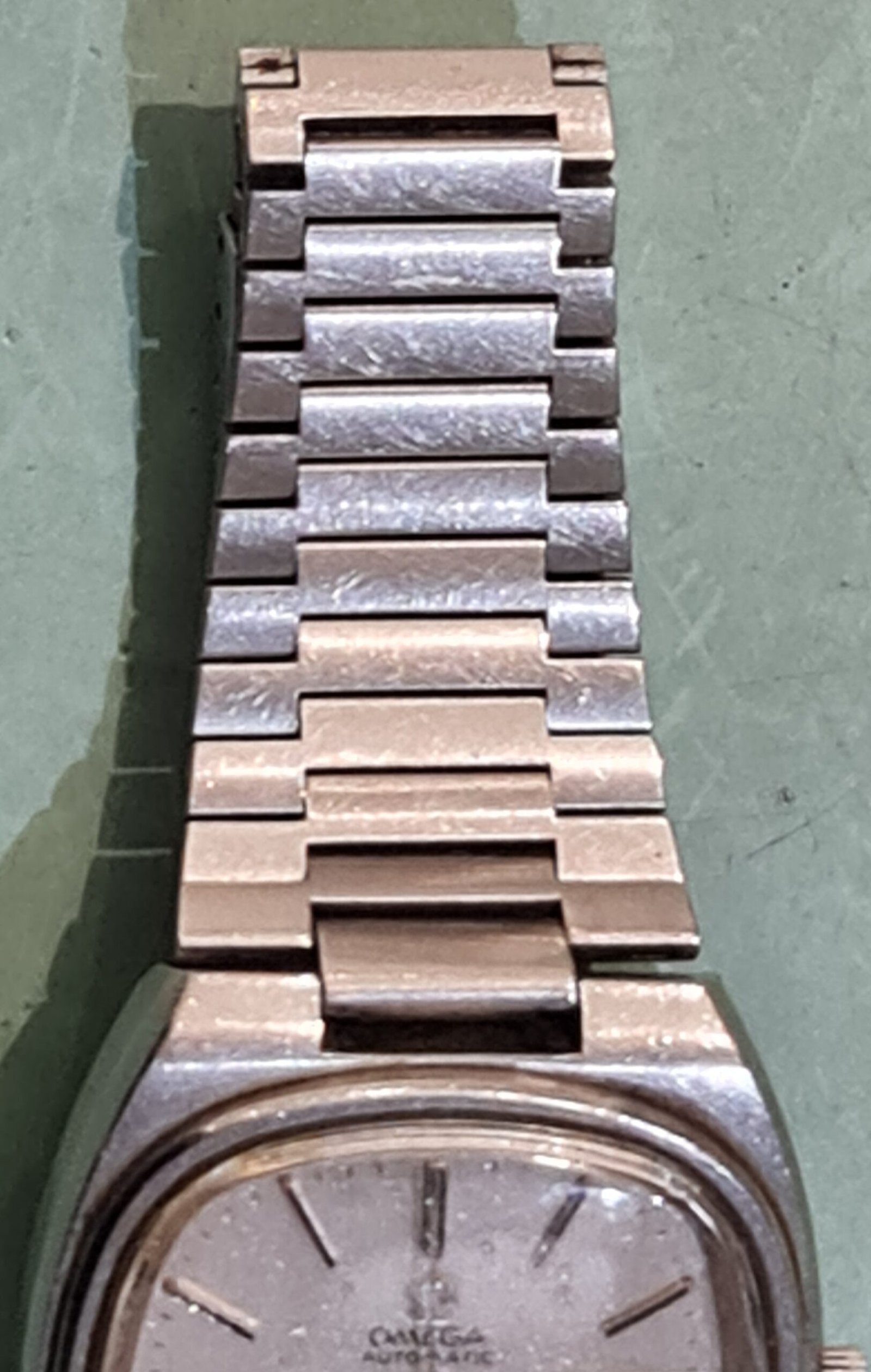 band horloge omega polijsten