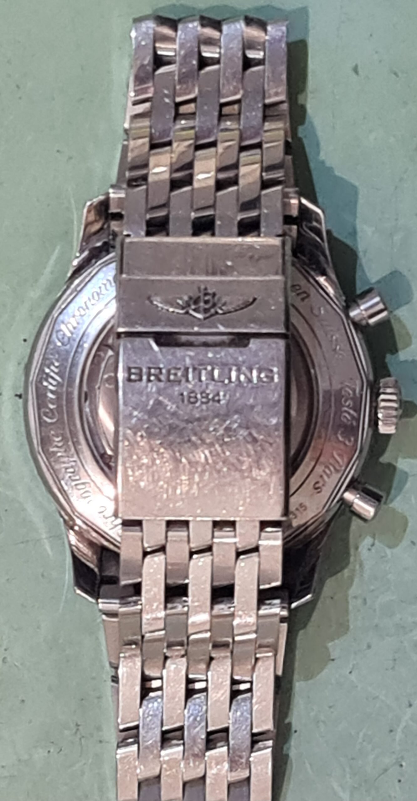 navitimer breitling bracelet polijsten
