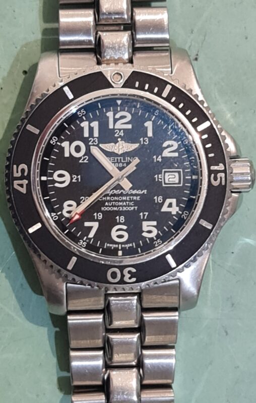 breitling superocean II kast polijsten