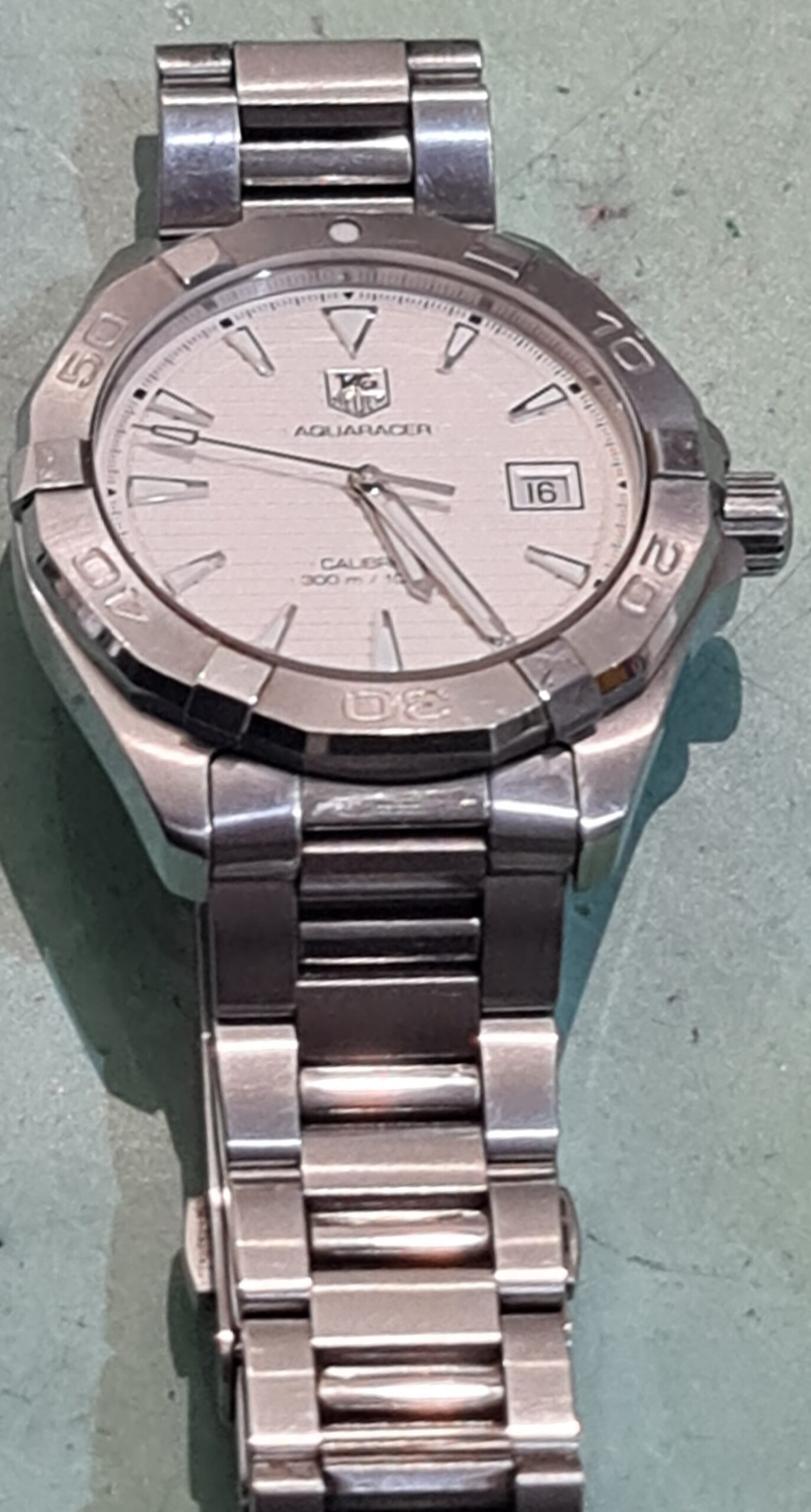 tag aquaracer bracelet polijsten