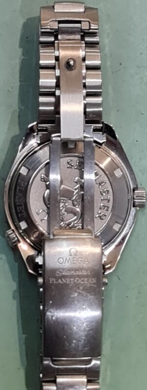 omega planet ocean horlogeband kapot