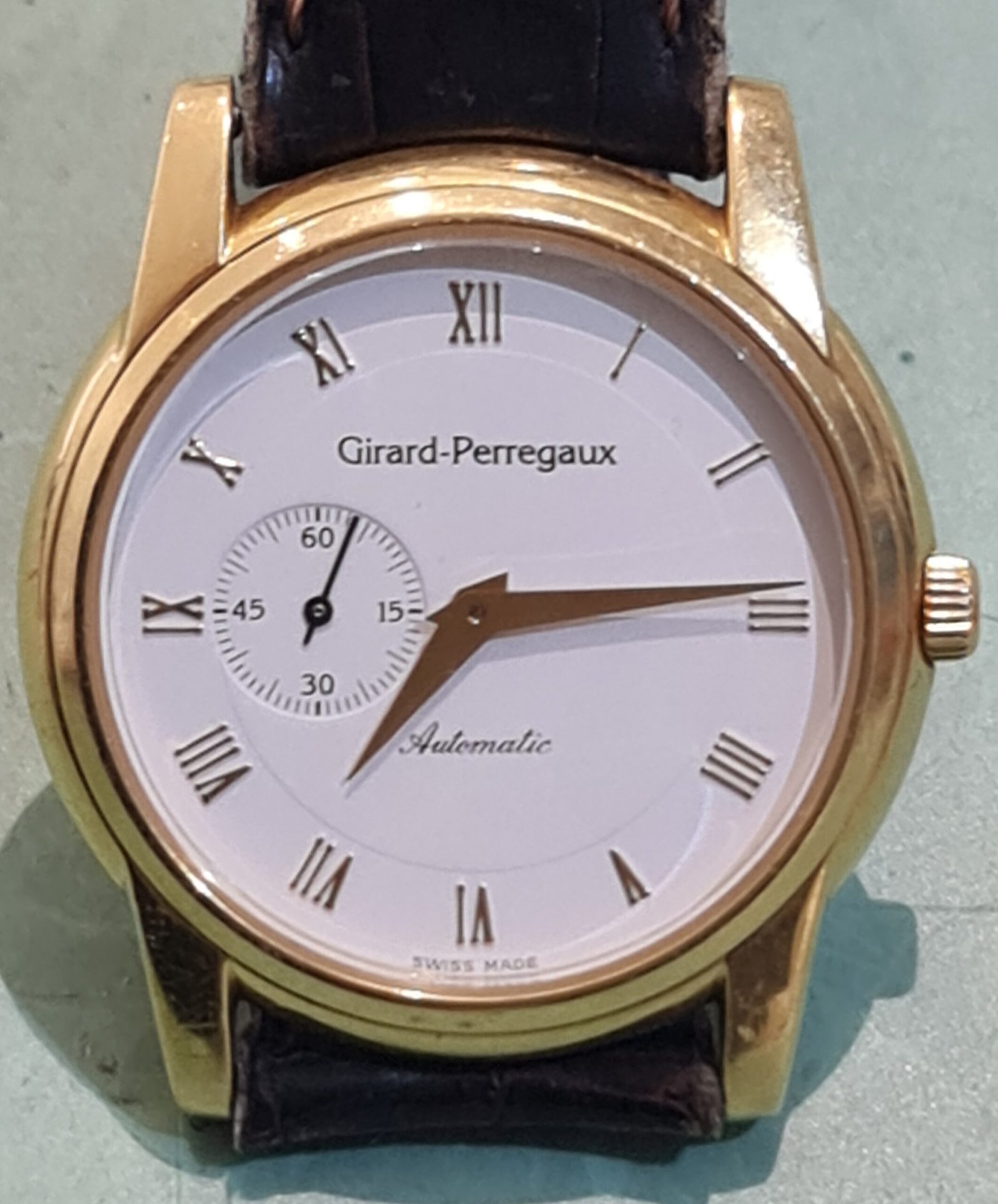 kapot horloge girard-perregaux