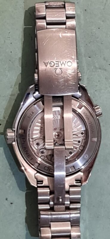 Omega Seamaster Planet polijsten