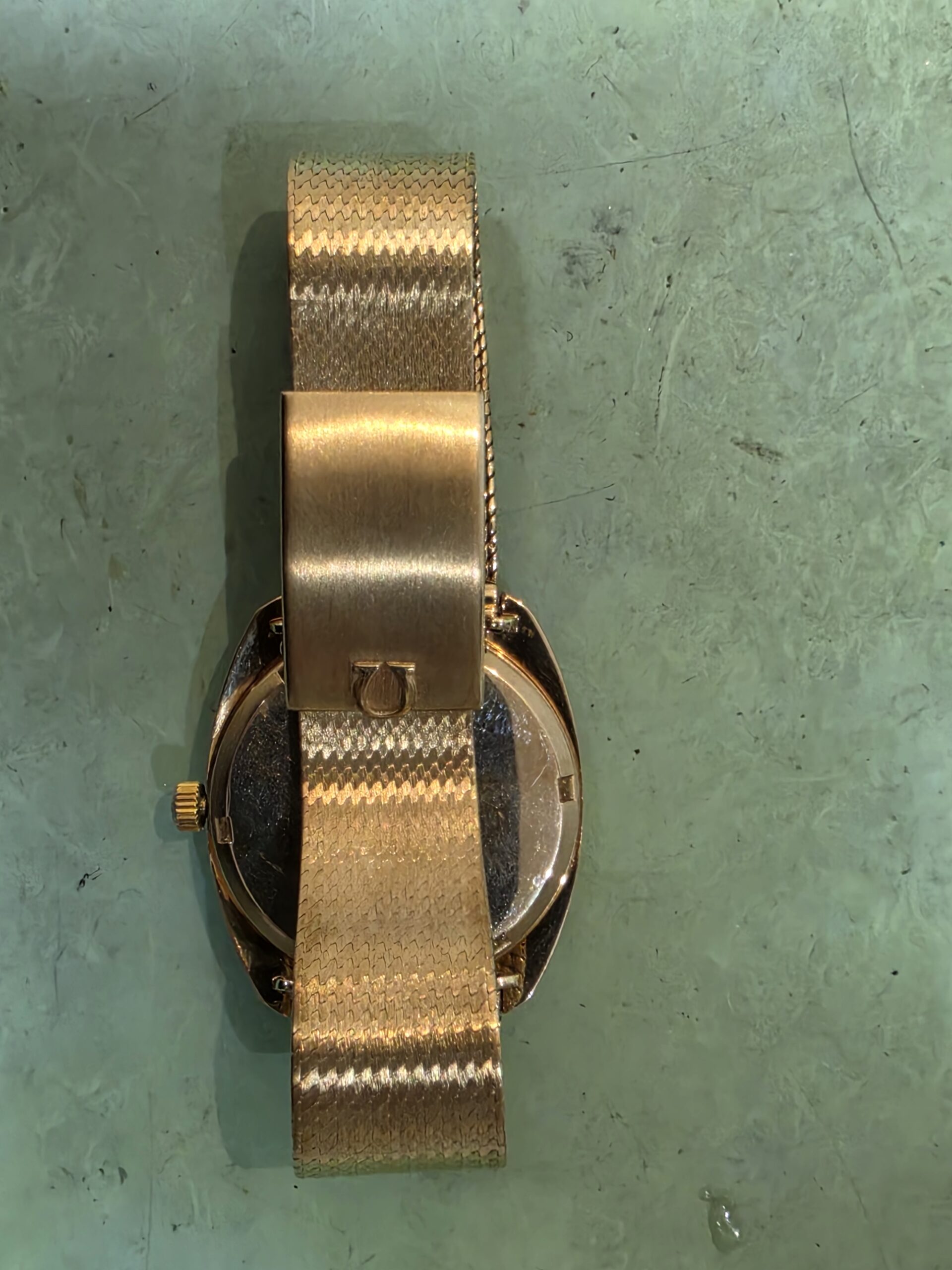 omega bracelet polijsten